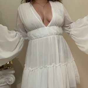 White ruffled dress. Size medium! Never worn.